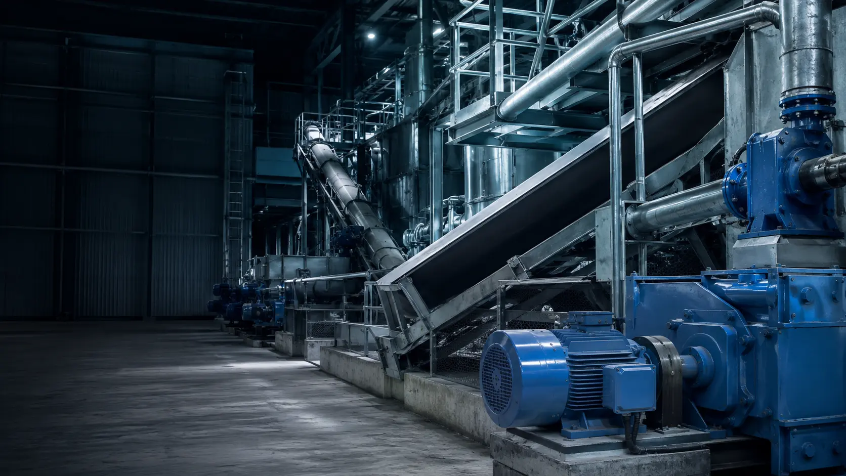 Industrial processing equipment with conveyors, electric motors, gear reducers and piping