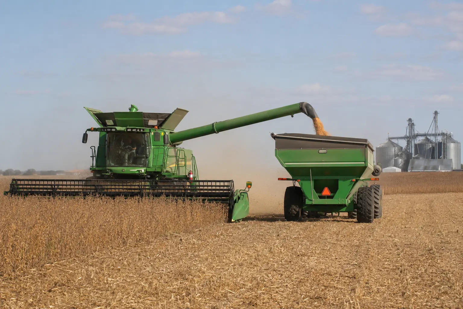 Agricultural processing equipment connected to grain handling systems